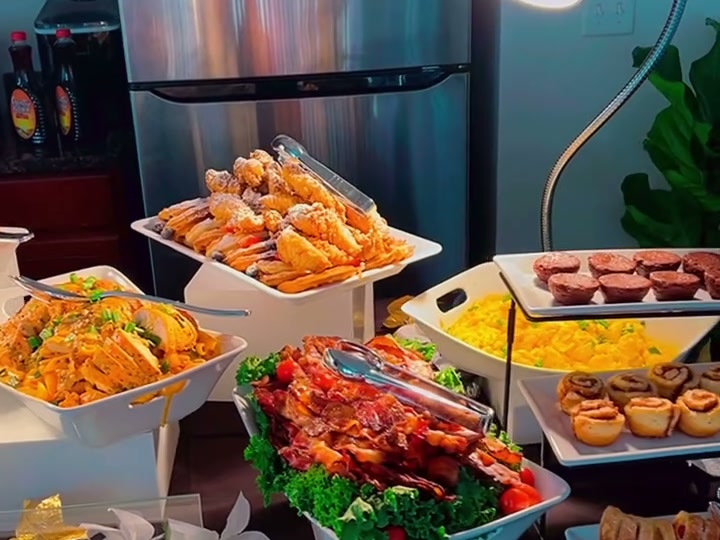 A generous Xtreme Eats catered food spread
